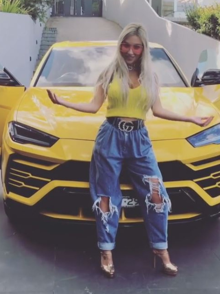 Nissy, pictured here with her bright yellow Lamborghini has claimed a stake in the home. Picture: Instagram