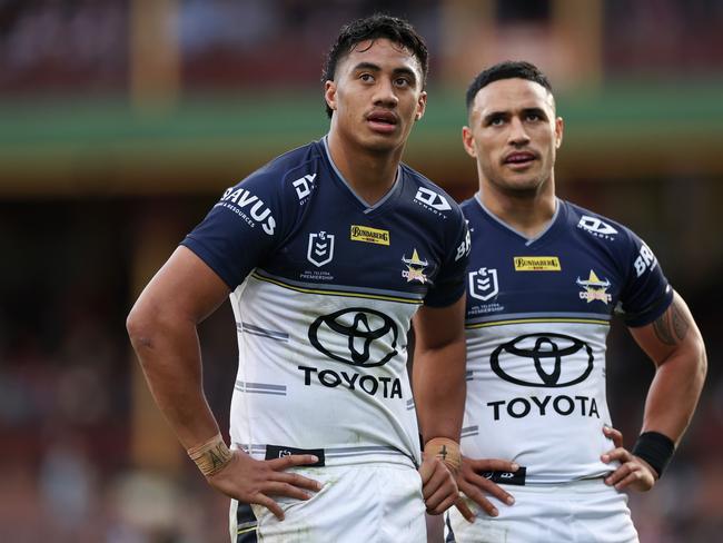 Murray Taulagi and Valentine Holmes of the Cowboys look on during thematch. Picture: Cameron Spencer/Getty Images