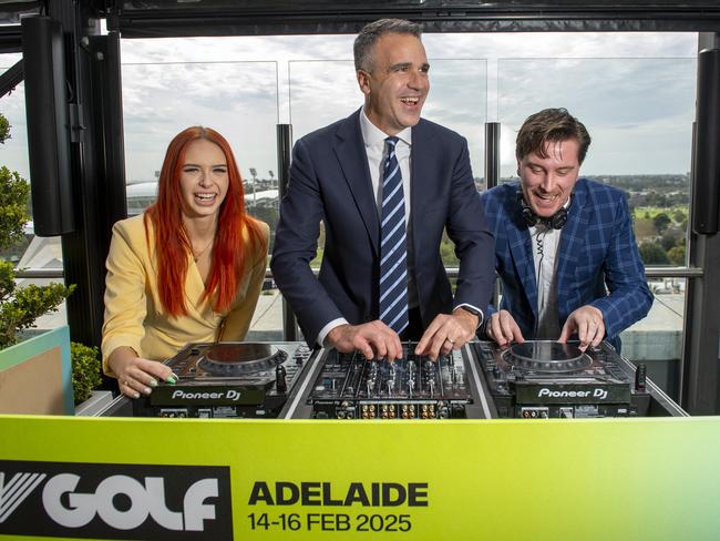 South Australian Premier Peter Malinauskas gets into the spirit of LIV golf from behind the decks. Picture Mark Brake