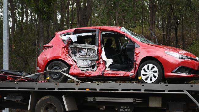 The female driver of this sedan was killed when it collided with an RV on the Bruce Hwy near Maryborough. Picture: Cody Fox