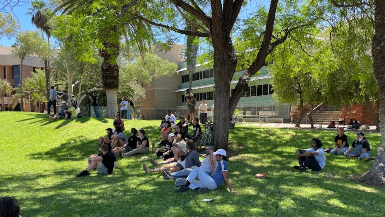 Crowds gather outside the Alice Springs court as they wait to hear the verdict in the Zach Rolfe murder trial. Mr Rolfe was found not guilty of all charges. Picture: Lee Robinson