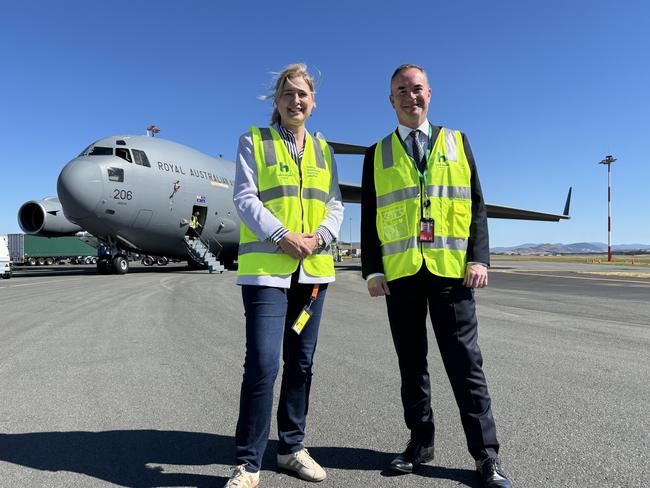 Federal Member for Franklin Julie Collins and Hobart Airport CEO Norris Carter in front of a Royal Australian Air Force Boeing C-17A Globemaster III. Picture: Simon McGuire.