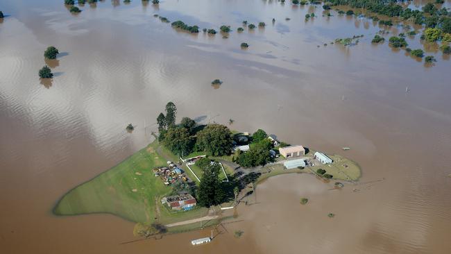 Aerial picture of flooded houses near Windsor, NSW. Picture: NCA NewsWire/Dylan Coker