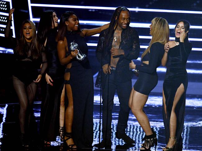 Fifth Harmony and Ty Dolla $ign accept the award for best collaboration video for “Work From Home” at the 2016 MTV Video Music Awards at Madison Square Garden on August 28, 2016 in New York City. Picture: AFP