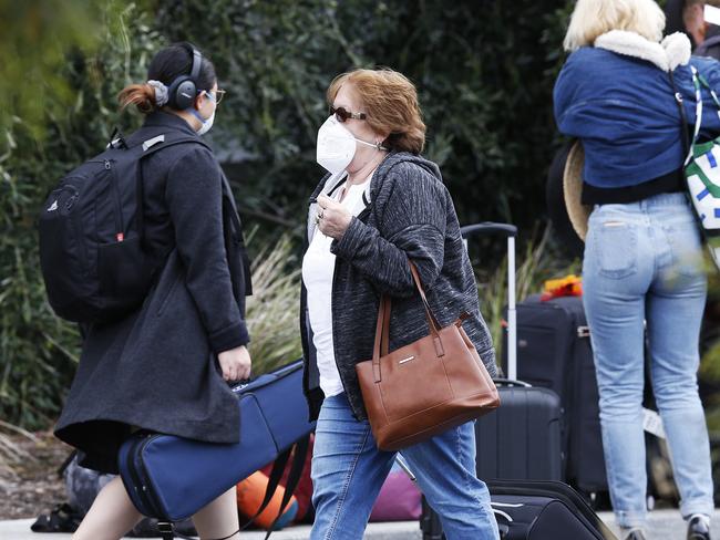 Passengers that arrived on a Jestar flight from Melbourne  at Hobart International Airport out the front of the Travelodge in Cambridge to start their mandatory two week quarantine. Picture: Zak Simmonds