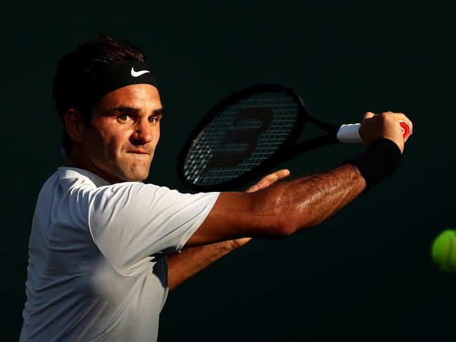 File Photo - Tennis Legend Roger Federer Announces Retirement - KEY BISCAYNE, FL - MARCH 24:  Roger Federer of Switzerland plays a backhand against Thanasi Kokkinakis of Australia in their second round match during the Miami Open Presented by Itau at Crandon Park Tennis Center on March 24, 2018 in Key Biscayne, Florida.  (Photo by Clive Brunskill/Getty Images)