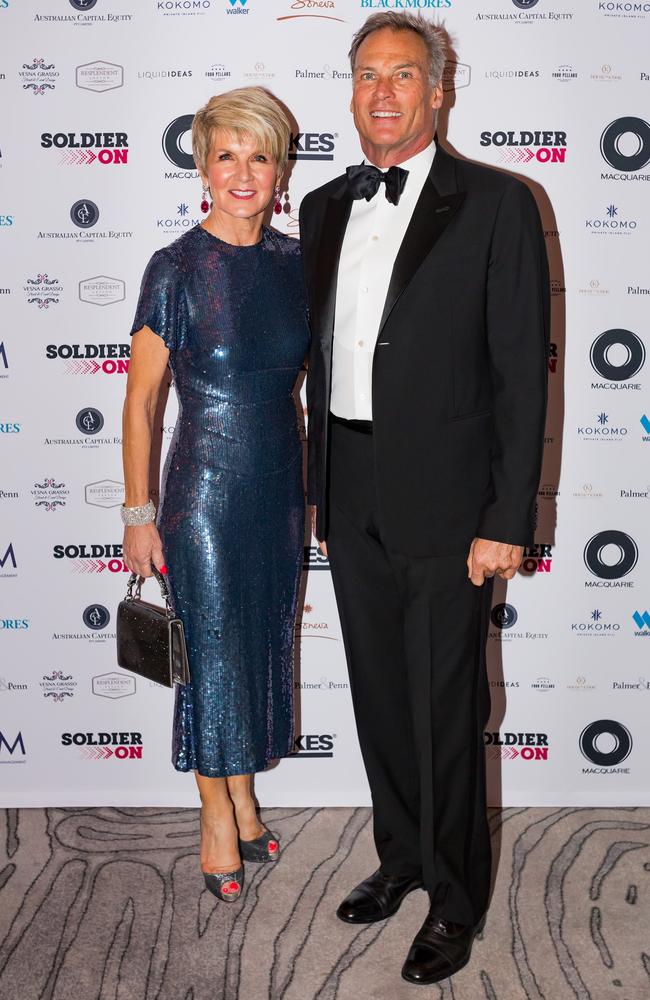 Julie Bishop, pictured with partner David Panton, has a number of engagements in line and won’t be waiting to called up to be next ambassador to the United States. Picture: Kai Godeck