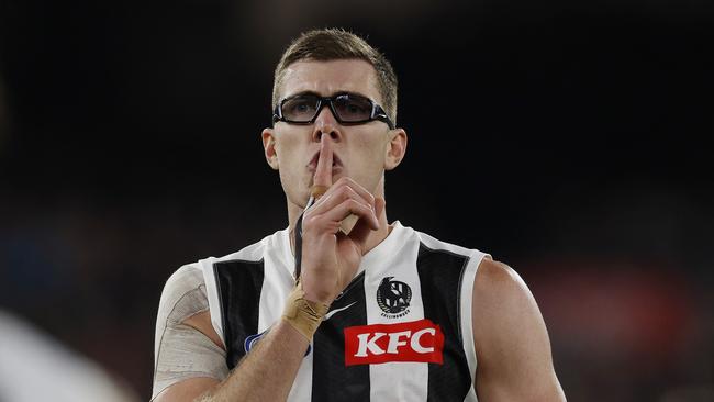 MELBOURNE , AUSTRALIA. May 3, 2024.  AFL. Carlton vs Collingwood at the MCG. Shhhh.  Mason Cox of the Magpies gestures towards the crowd after kicking a 2nd qtr goal    . Pic: Michael Klein