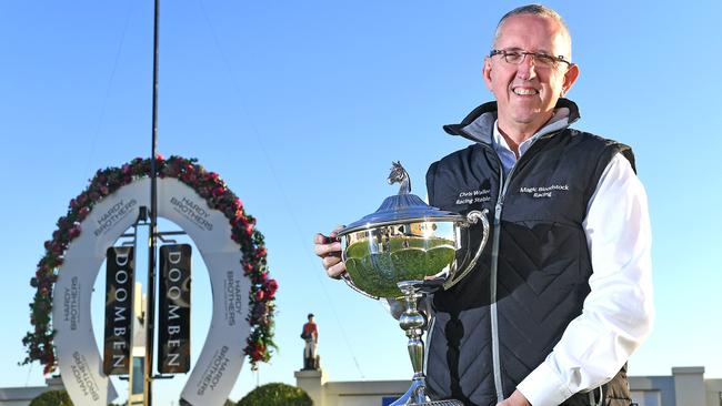 Winx part owner Peter Tighe with the Queensland Oaks trophy. Picture: AAP