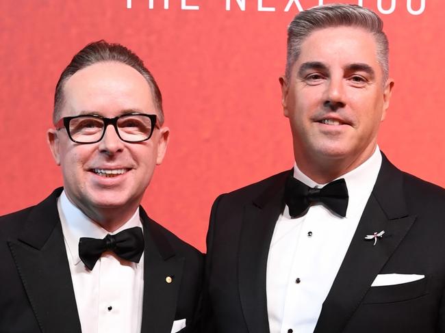 SYDNEY, AUSTRALIA - MARCH 31: Qantas CEO Alan Joyce (L) and husband Shane Lloyd attend the Qantas 100th Gala Dinner at Jetbase 96 hangar at Sydney's International Airport on March 31, 2023 in Sydney, Australia. (Photo by James D. Morgan/Getty Images)