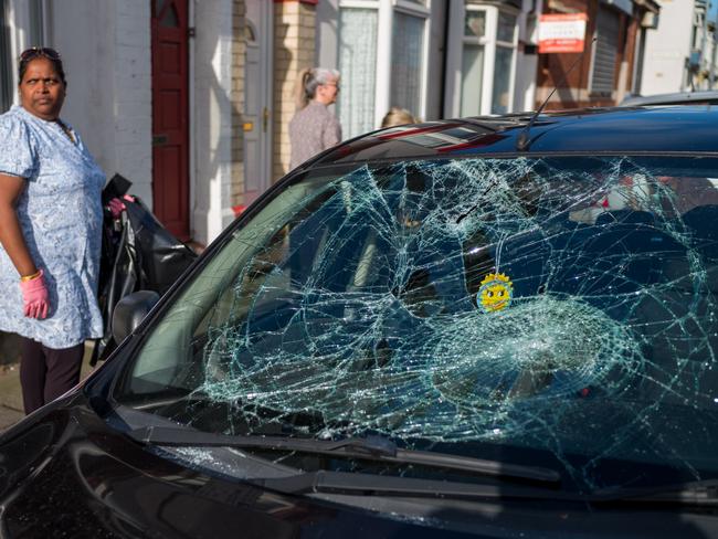 Damage to a car in Middlesbrough, England, by rioters. Picture: Getty Images