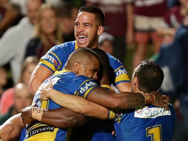 Parramatta's Semi Radradra celebrates scoring a try wth his team matesduring the round 7 NRL game between the Manly Sea Eagles and the Parramatta Eels at Brookvale Oval,Brookvale .Picture Gregg Porteous