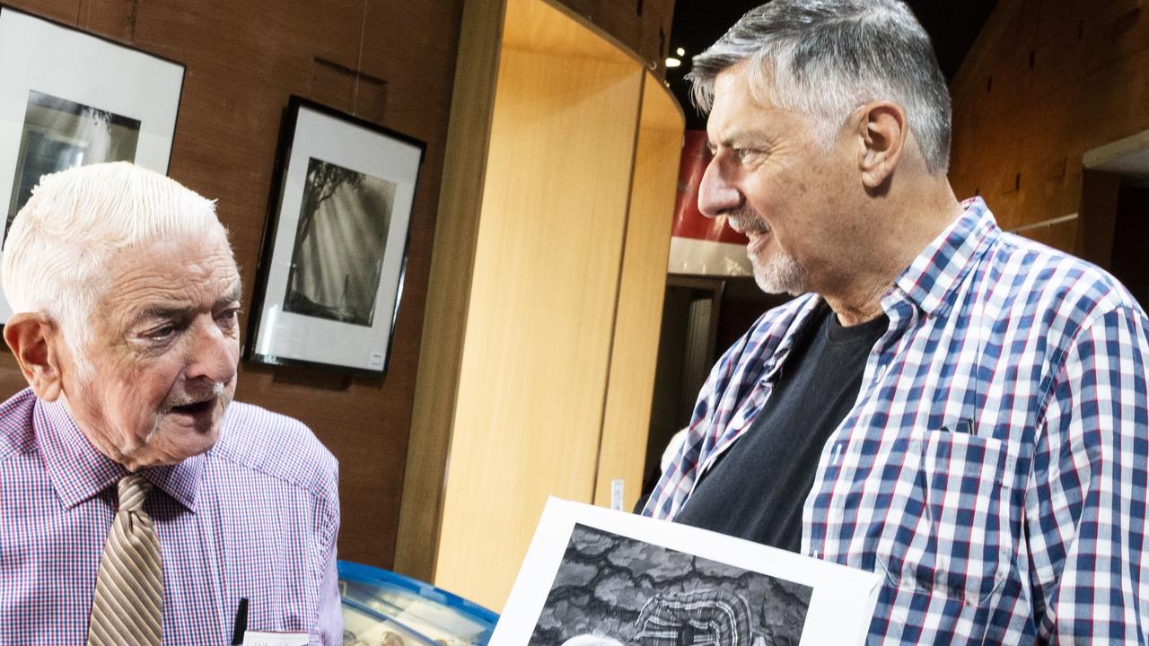 LIFETIME HONOUR: Toowoomba photographer, Graham Burstow (left) chats with fellow photographer Doug Spowart. Graham was presented with life membership from the Australian Cultural Library this week.