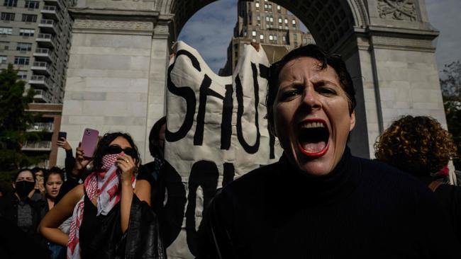 A woman shouts slogans as NYU (New York University) students participate in a walkout during a national day of action called by the "Students for Justice in Palestine" at Washington Square park in New York on October 25, 2023. Picture: Ed Jones/AFP