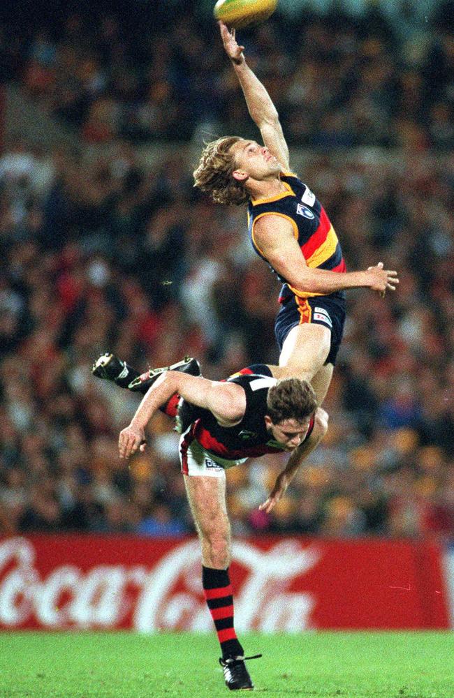 Adelaide’s Tony Modra mas more an acrobat than a footballer at times during his career, taking some of the most amazing marks you’ll ever see.