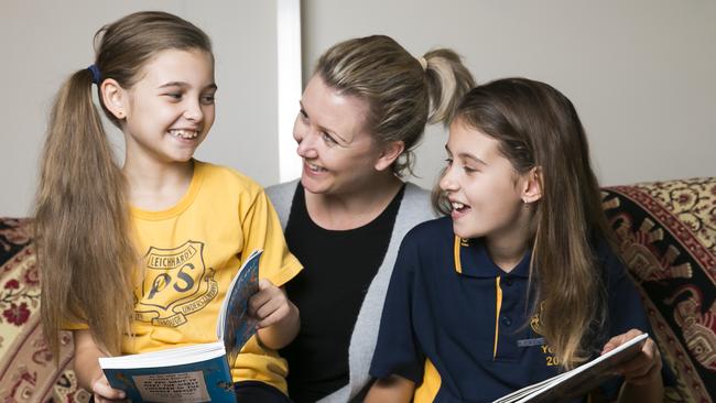 Amy De Celis and daughters Piper, 8, and Montana, 11, enjoy complex stories. Picture: Dylan Robinson