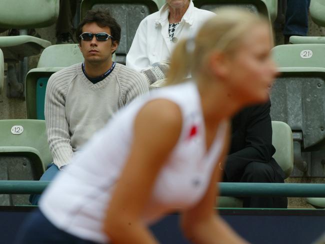 Jelena was reportedly estranged from her family at this stage after she began dating Brazilian racing driver Enrique Bernoldi, pictured watching Jelena at the German Open in 2003. He had reportedly helped her flee her family home in 2002 with just a tennis racket and a bag, but no money or credit cards. Photo: AP Photo/Franka Bruns