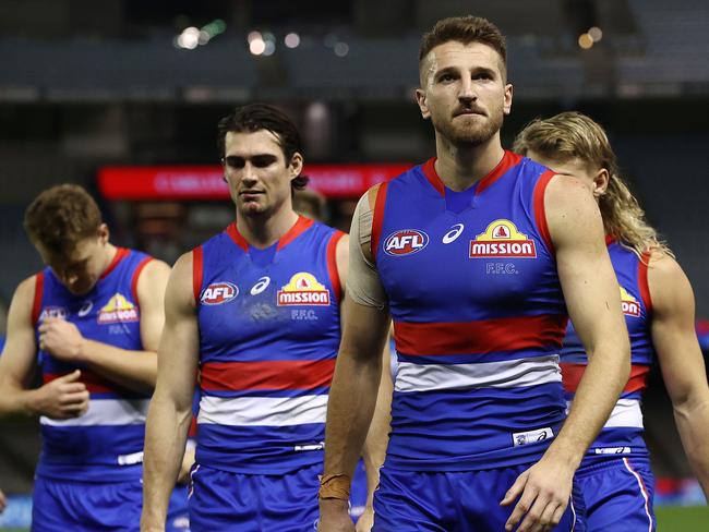 AFL Round 21. Western Bulldogs vs Essendon at Marvel Stadium, Melbourne.  08/08.2021.  Bulldog Marcus Bontempelli leads his team off Marvel Stadium after losing to Essendon     .  Pic: Michael Klein