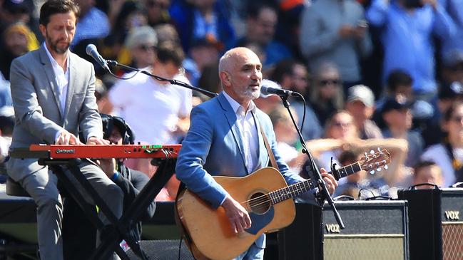 Paul Kelly sings during the 2019 AFL Grand Final pre-game entertainment. Picture: Mark Stewart