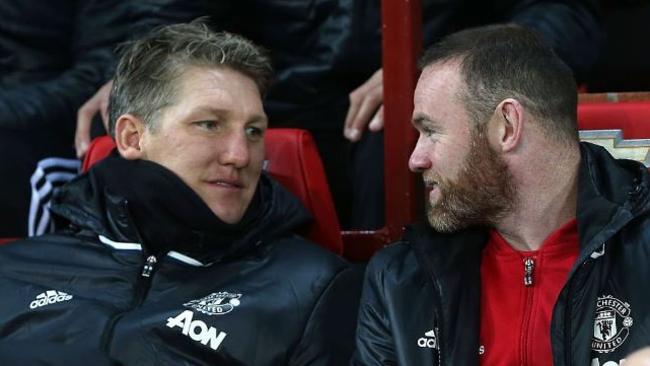 Bastian Schweinsteiger and Wayne Rooney on Manchester United’s bench.