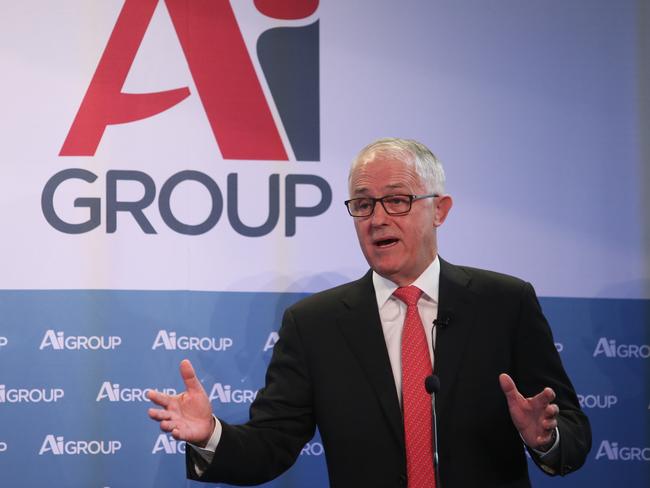 Prime Minister Malcolm Turnbull listens at yesterday’s Ai Group energy breakfast at the National Press Club in Canberra.