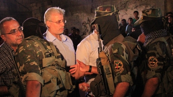 Caption: In 2012, Palestinian Islamic Jihad organised a memorial ceremony for Remah Al-Hasani, Fayez Elhasani's son. At this ceremony, Mr Elhasani can be seen shaking hands with members of PIJ. Picture: Supplied/ source https://paltoday.ps/ar/post/146812/%D8%A8%D8%A7%D9%84%D8%B5%D9%88%D8%B1-%D8%A7%D9%84%D8%AC%D9%87%D8%A7%D8%AF-%D9%8A%D9%86%D8%B8%D9%85-%D8%AD%D9%81%D9%84%D8%A7-%D8%AA%D8%A3%D8%A8%D9%8A%D9%86%D9%8A