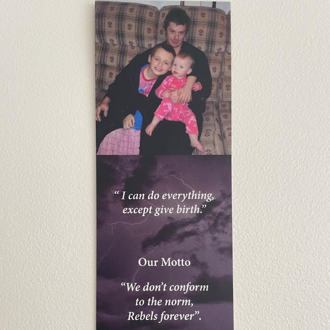 Bookmarks with photos of Mr Aalbers and his children printed on them with one of his iconic quotes, “I can do everything except give birth”, were given to guests at the funeral.