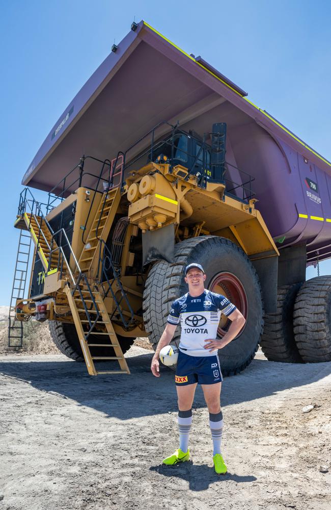 Cowboys co-captain Tom Dearden in front of 'his' haul truck.