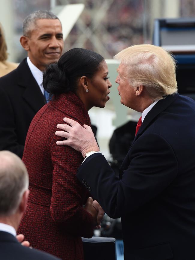 President Barack Obama watches as President-elect Donald Trump greets US First Lady Michelle Obama during the Presidential Inauguration at the US Capitol in Washington, DC, on January 20, 2017. Picture: AFP