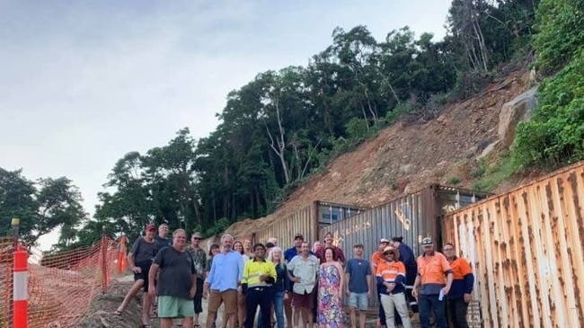 Cape Tribulation locals and road works employees have celebrated the ‘first birthday’ of a landslide which left the remote town isolated, following torrential rain and flooding after Cyclone Jasper in 2023. Photo: Supplied.