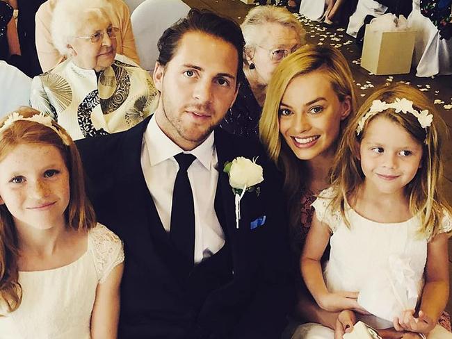 Margot with her new husband Tom Ackerley, pictured at a wedding. Picture: Instagram