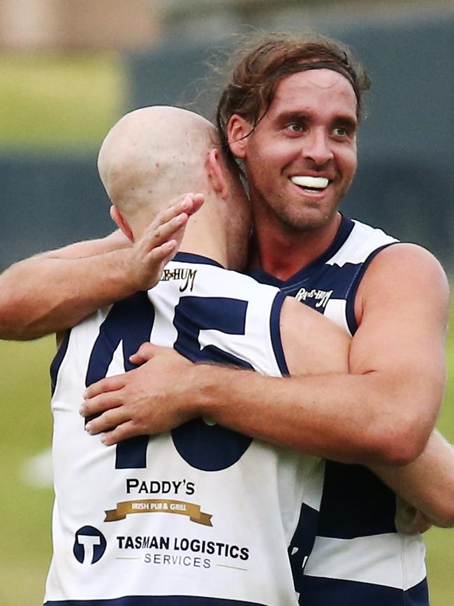 Port Douglas captain Kye Chapple and Adam Gross celebrate winning the AFL Cairns men's grand final match between the Port Douglas Crocs and the South Cairns Cutters, played at Cazalys Stadium. PICTURE: BRENDAN RADKE