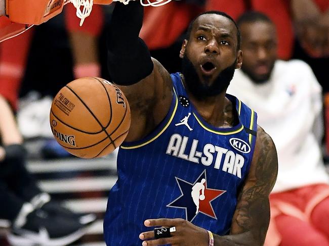 CHICAGO, ILLINOIS - FEBRUARY 16: LeBron James #2 of Team LeBron dunks the ball in the third quarter against Team Giannis during the 69th NBA All-Star Game at the United Center on February 16, 2020 in Chicago, Illinois. NOTE TO USER: User expressly acknowledges and agrees that, by downloading and or using this photograph, User is consenting to the terms and conditions of the Getty Images License Agreement.   Stacy Revere/Getty Images/AFP == FOR NEWSPAPERS, INTERNET, TELCOS & TELEVISION USE ONLY ==