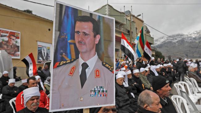 Supporters of Syrian President Bashar al-Assad during a rally. PIcture: AFP