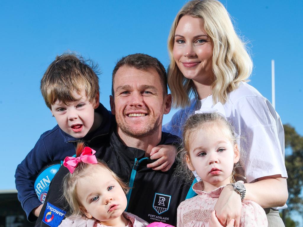 Gray with his family after announcing his retirement. Picture: Sarah Reed