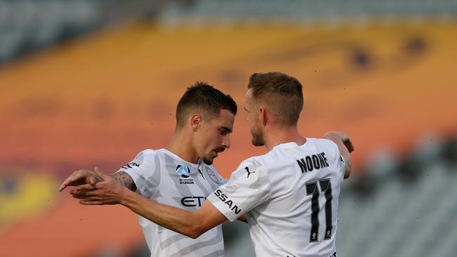 Jamie Maclaren (left) celebrates with teammate Craig Noone. Picture: Ashley Feder/Getty Images