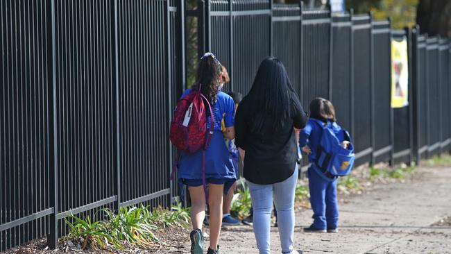 Kids and parents at Wattawa Heights Public School in Bankstown. Picture: Richard Dobson