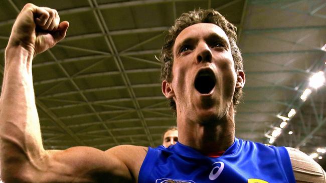 Western Bulldogs vs. Sydney Swans Robert Bob Murphy leads the Bulldogs team down the race after the win ES) (N) Picture: Wayne Ludbey