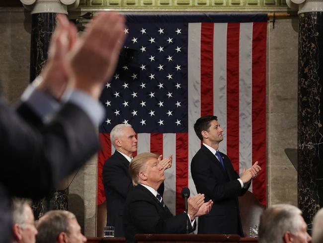 President Trump and the entire chamber direct applause to Carryn Owens, widow of Navy Seal William Owens.