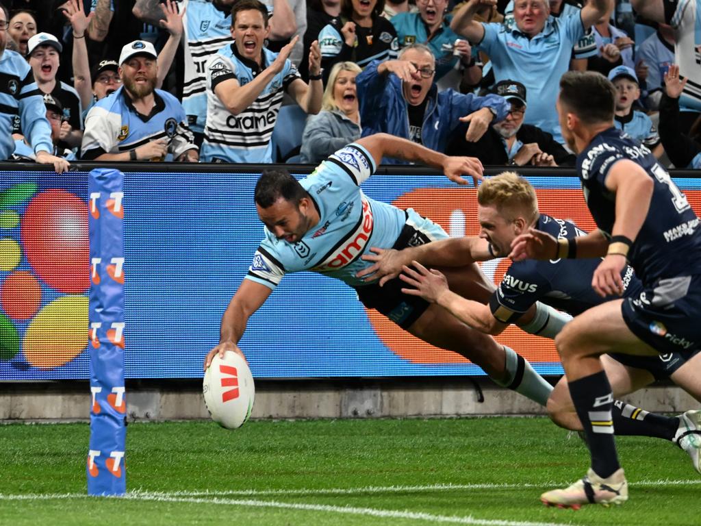 Braydon Trindall scores a beauty against the Cowboys. Picture: NRL Photos/Louis Bockos