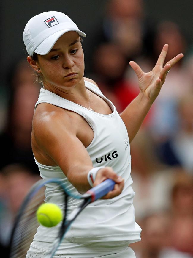 Ash Barty returns against Carla Suarez Navarro. Picture: AFP