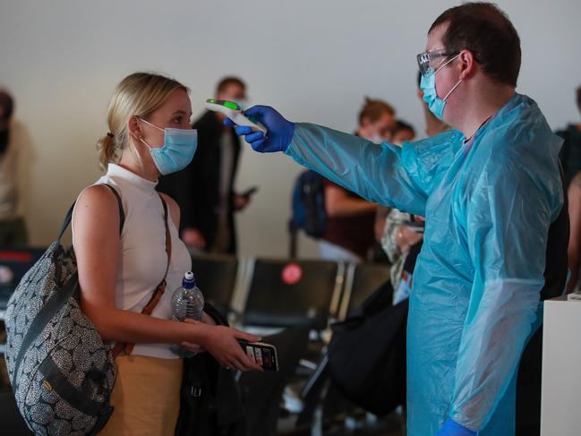 Airline passengers undergoing screening tests. Pcture: Justin Lloyd