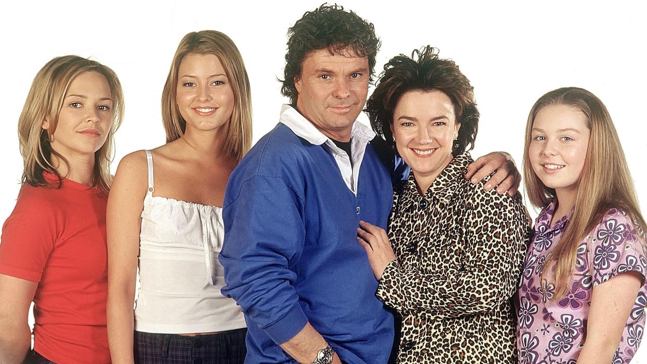 (L-R) Carla Bonner, (Stephanie), Holly Valance (Felicity), Shane Connor (Joe), Janet Andrewartha (Lyn) and Kate Keltie (Michelle) as the Scully family in Neighbours.