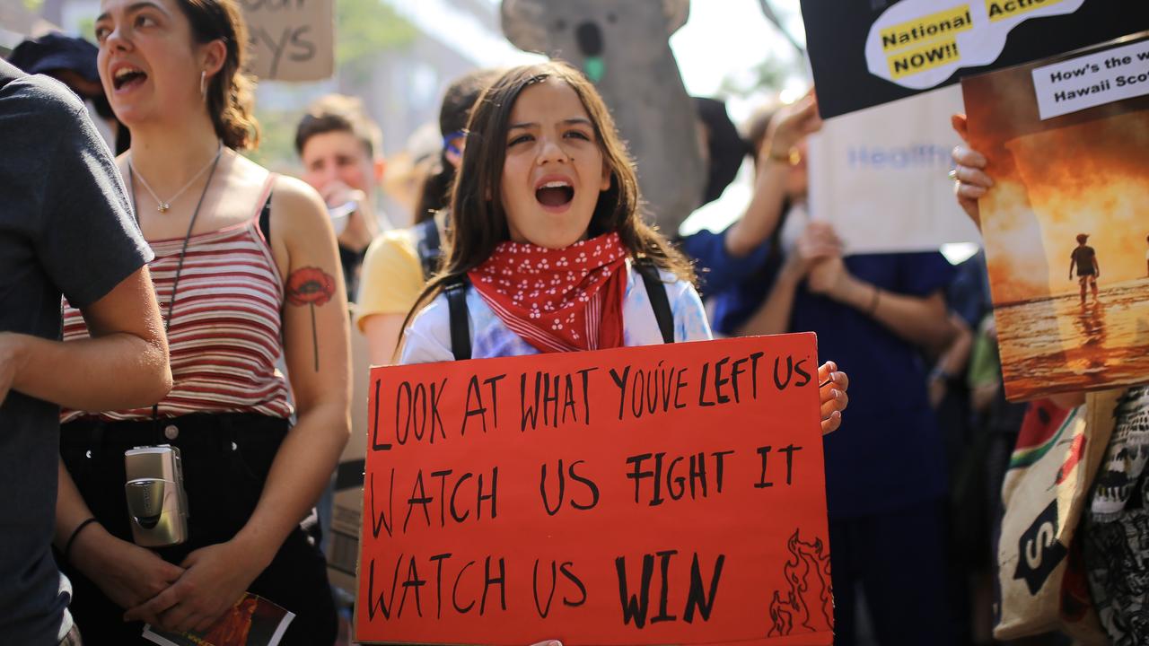 Teenage climate activists Izzy Raj-Seppings calls for more government action to tackle climate change during a 2019 protest outside Kirribilli House in Sydney. Picture: AAP Image