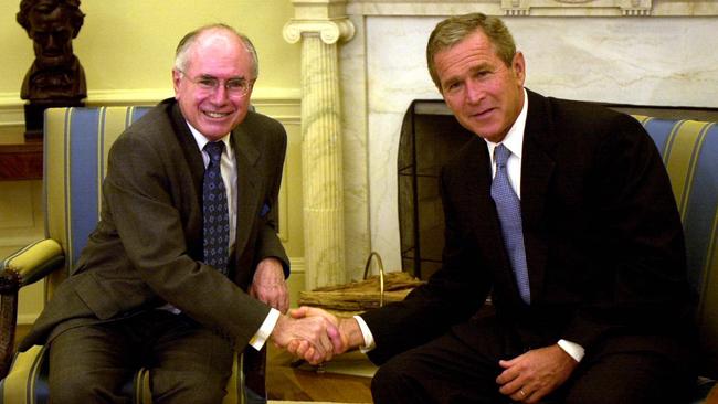 Prime Minister John Howard with US president George W Bush in the oval office at the White House in Washington on September 10, 2001.