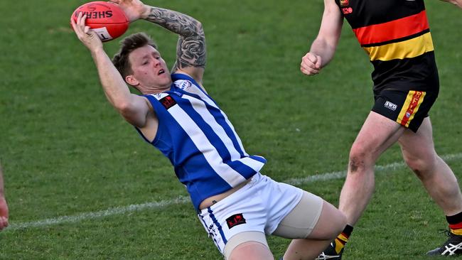 WRFL: Albanvale’s Corey Hall takes a diving mark. Picture: Andy Brownbill