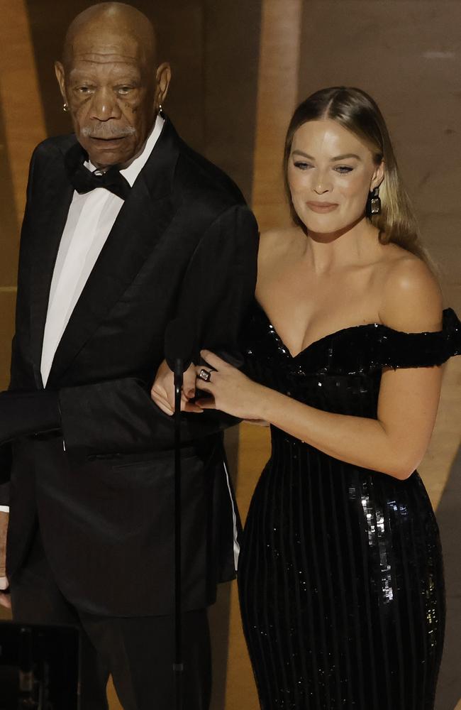Morgan Freeman and Margot Robbie speak onstage during the 95th Annual Academy Awards at Dolby Theatre. Picture: Kevin Winter/Getty Images