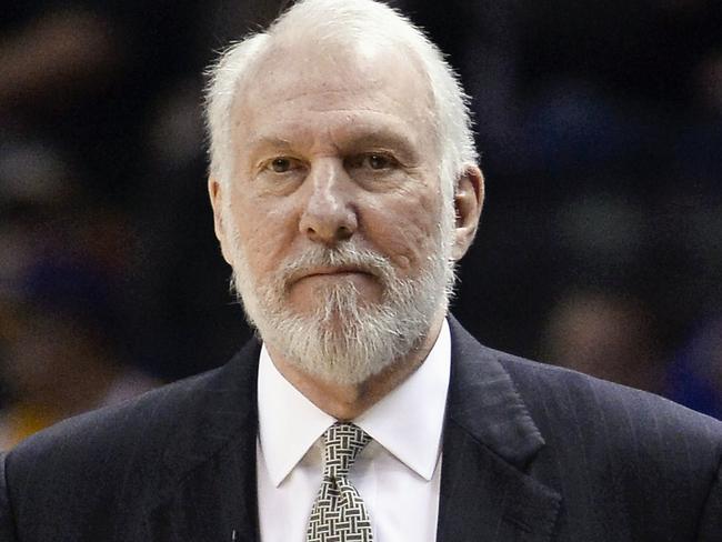 FILE - This is a March 8, 2015, file photo showing San Antonio Spurs head coach Gregg Popovich watching play during the first half of an NBA basketball game against the Chicago Bulls in San Antonio. Popovich, who has led the San Antonio Spurs to five NBA titles, will replace Mike Krzyzewski as the U.S. basketball coach following the 2016 Olympics. (AP Photo/Darren Abate, File)