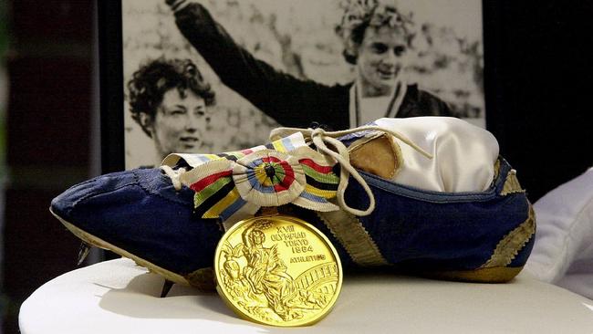 Betty Cuthbert's gold medal and shoes from the 1964 Tokoyo Olympics.