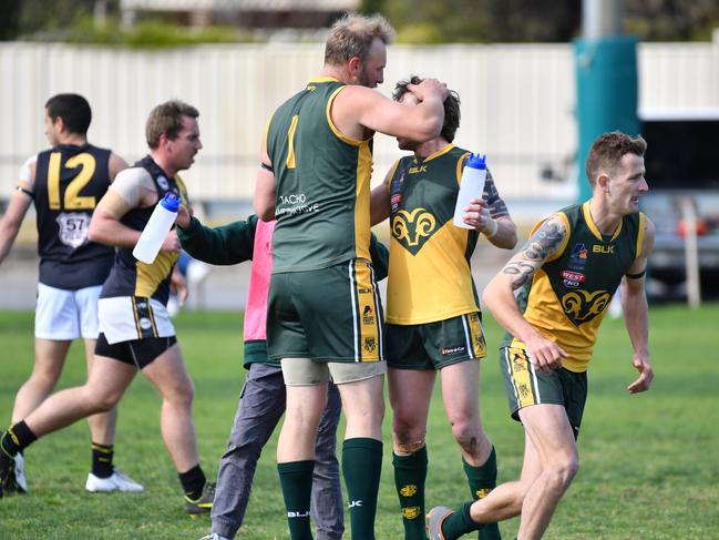 Centurion goalkicker Ryan Wade (left) playing against St Paul’s Old Scholars in the Adelaide Footy League’s division seven preliminary final on Saturday. Picture: AAP/Keryn Stevens